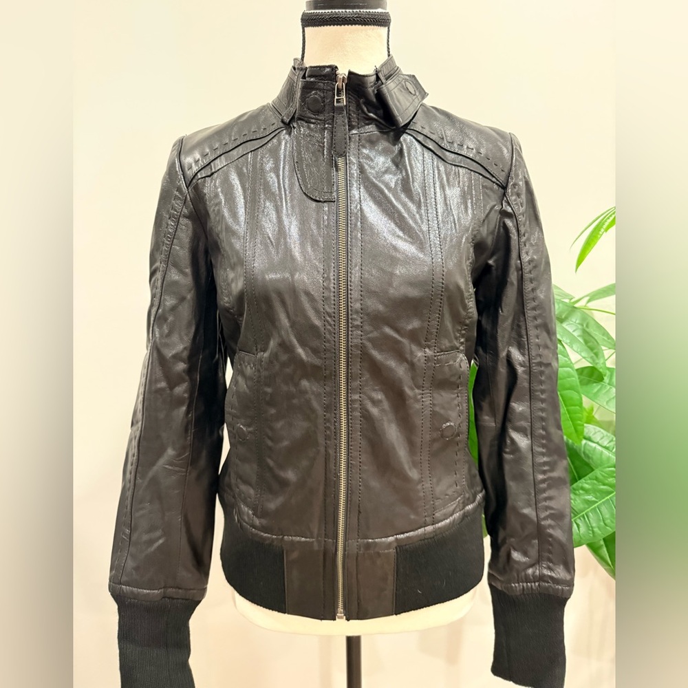 Black bomber leather jacket with t-shirt interior